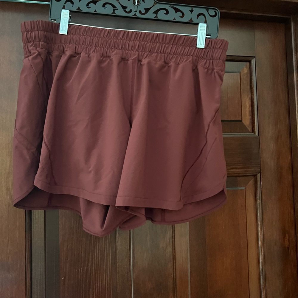 Lululemon maroon / rust colored Track that MR short 5” size 16